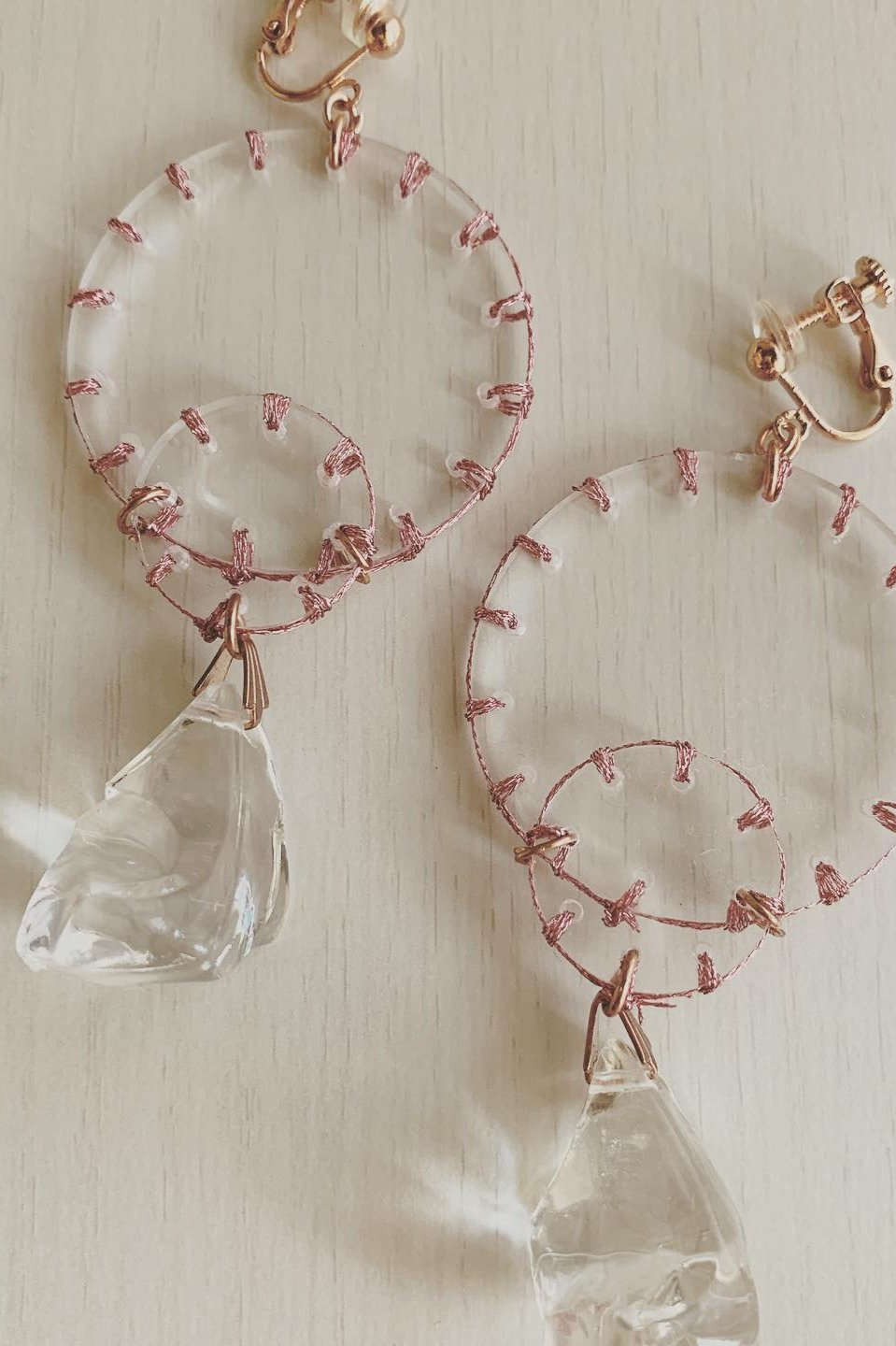 pink stitch crystal earrings