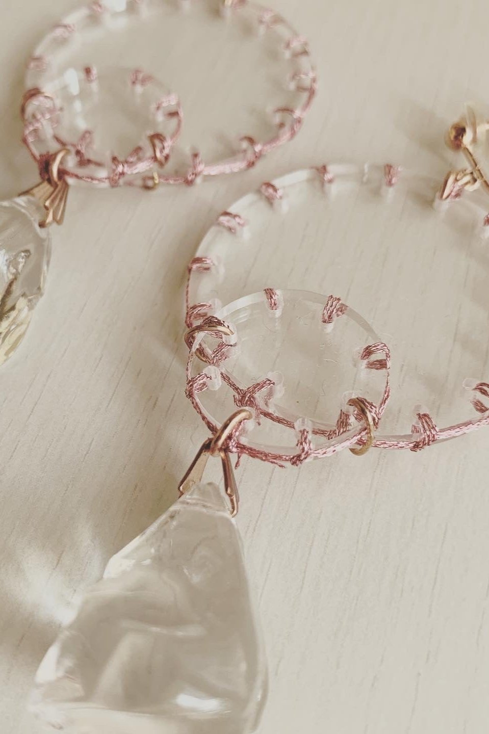 pink stitch crystal earrings