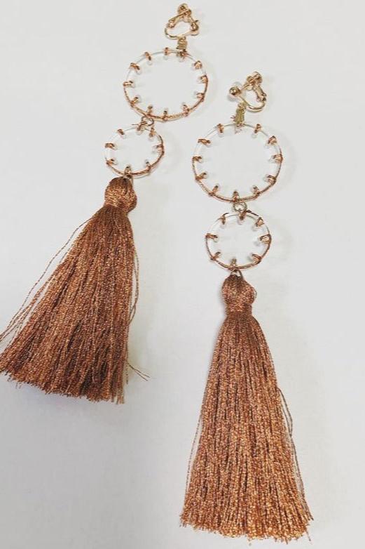 orange stitch tassel earrings