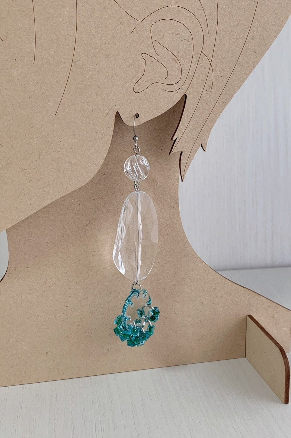 orange stitch tassel earrings