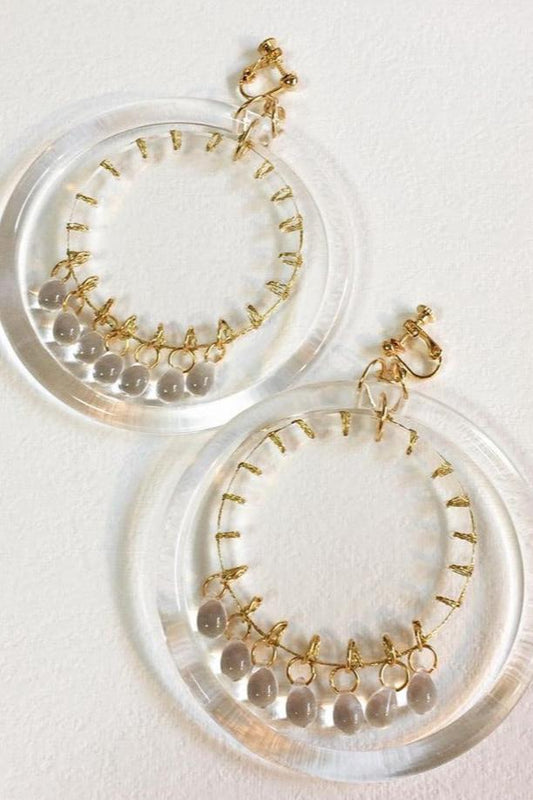 gold stitch clear hoop earrings